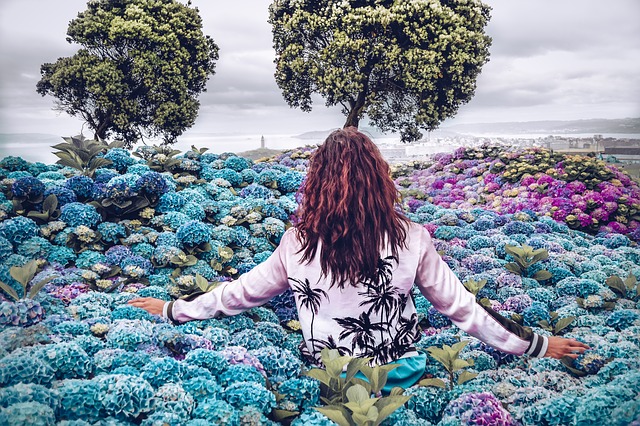 Woman in beautiful field of flowers